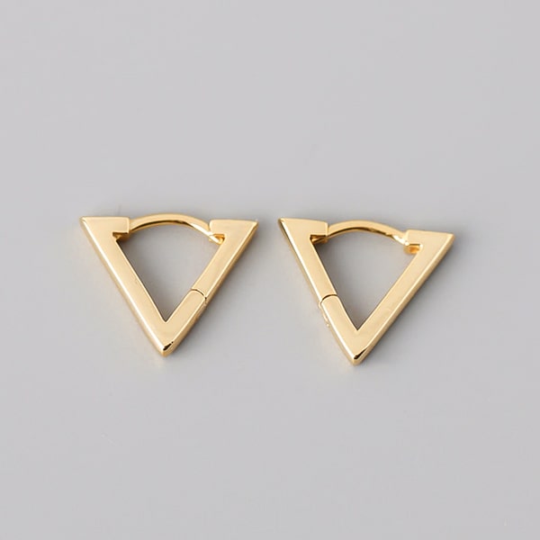 Gold triangle huggie hoop earrings detail