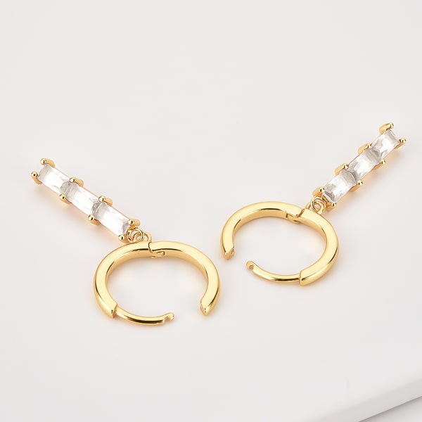 Gold triple baguette bar drop hoop earrings detail