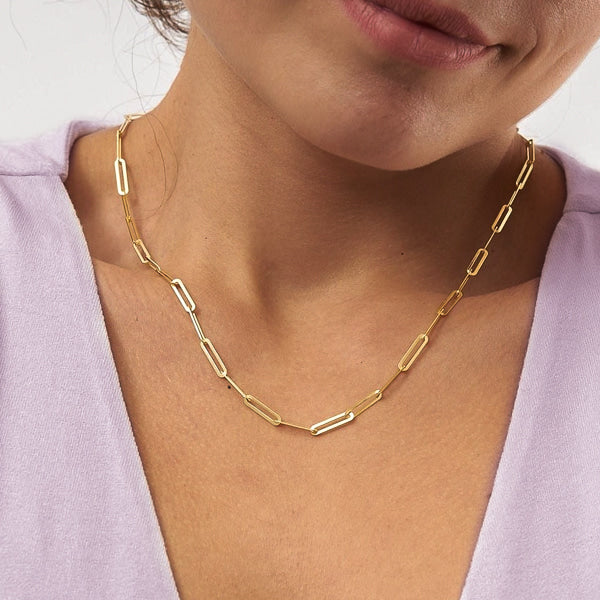 Woman wearing gold vermeil paperclip chain necklace