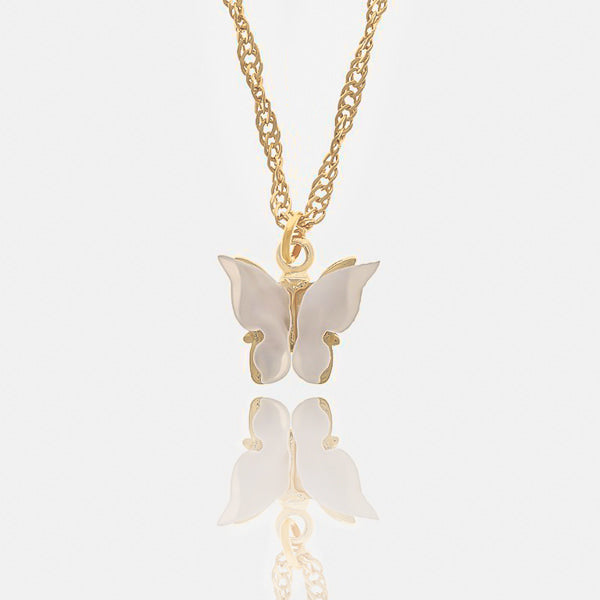 White butterfly on a golden necklace details