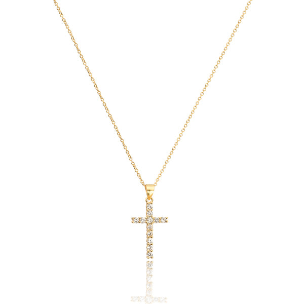 White crystal cross on a golden necklace