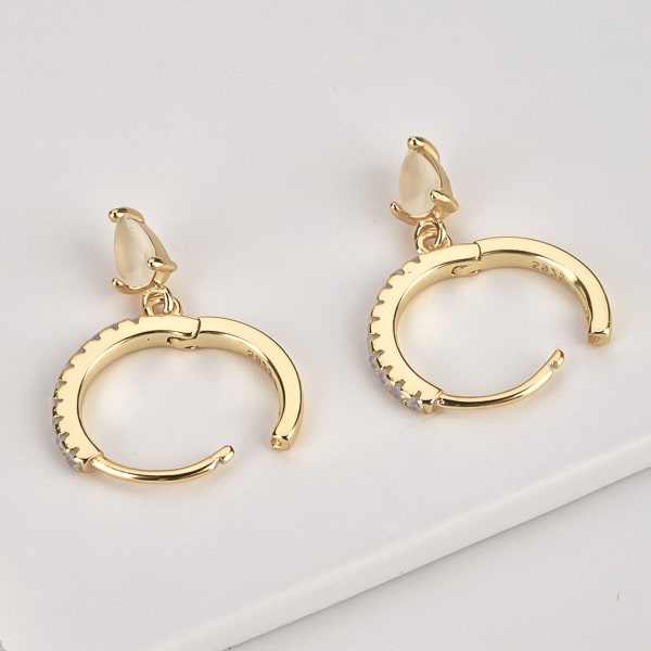 Gold white crystal huggie teardrop earrings details