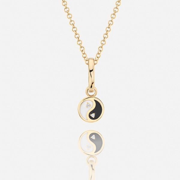 Gold yin yang necklace display