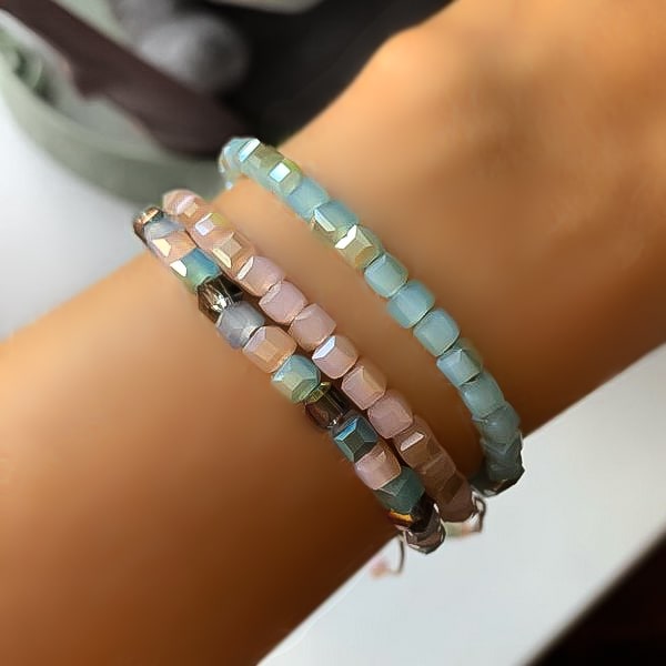 Woman wearing an ice blue square crystal bracelet