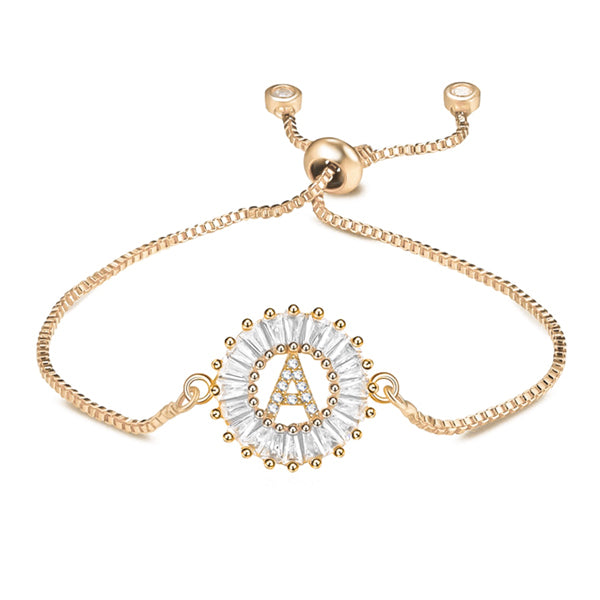 Gold initial letter bracelet with sparkling crystals and adjustable bolo closure