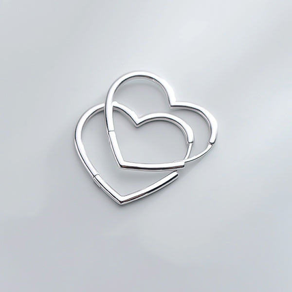 Large silver heart hoop earrings details