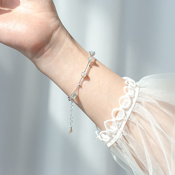 Two-layer labradorite bead bracelet on woman's wrist