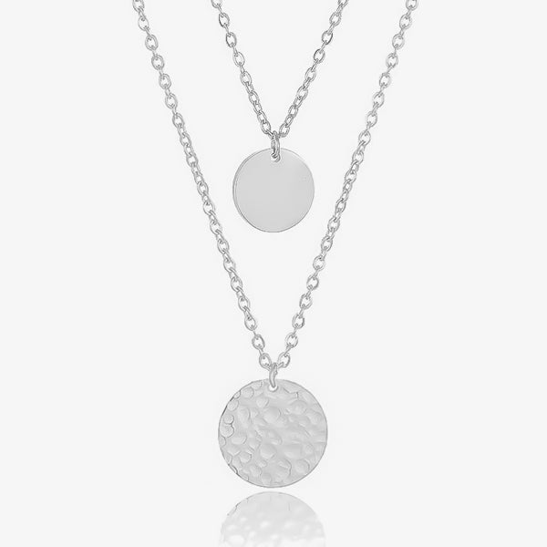 Smooth and hammered silver coin pendants on dainty layered chains