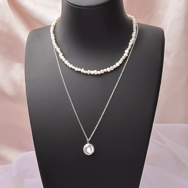 Display of a layered freshwater pearl necklace set