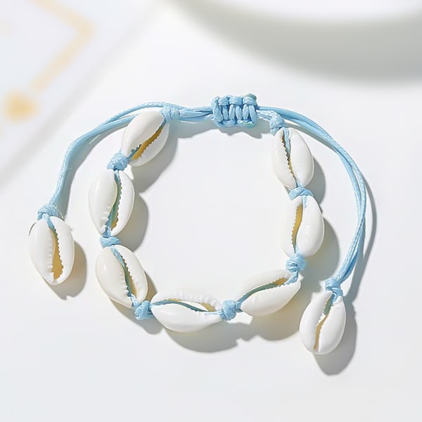 Light blue cowrie shell ankle bracelet detailed close up