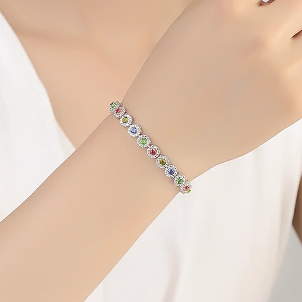 Multicolor halo crystal bracelet on a woman's wrist