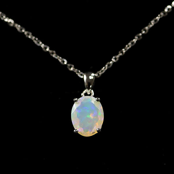 White opal necklace on dark background