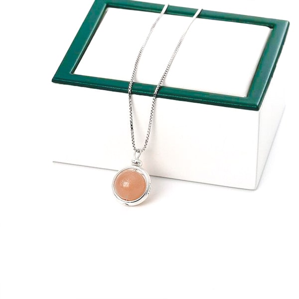 Orange moonstone pendant necklace closeup image