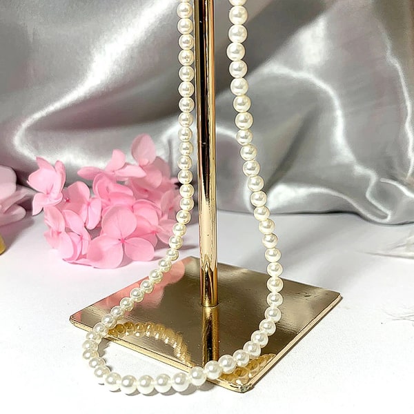 display of a 4mm pearl necklace