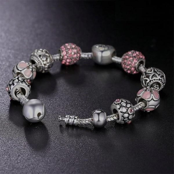 Pink charm bracelet with snake chain