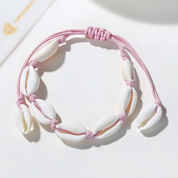 Pink cowrie shell ankle bracelet detailed close up