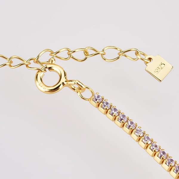 Details of the gold tennis choker necklace with purple cubic zirconia stones