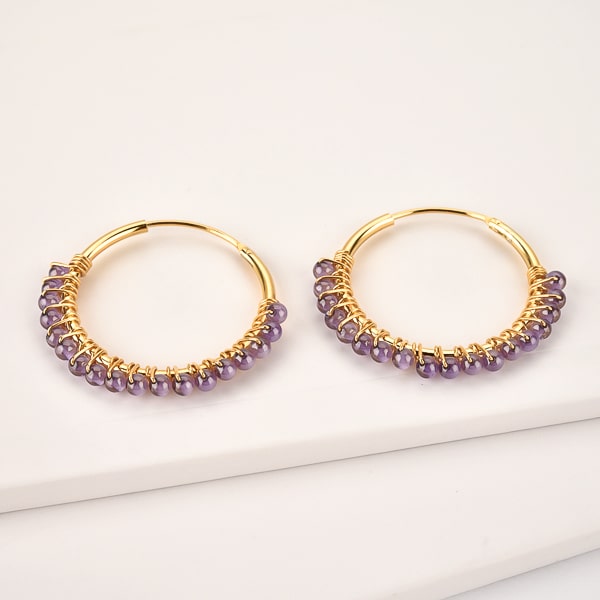 Purple bead hoop earrings detail