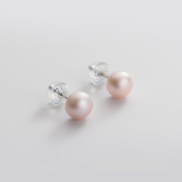 Large purple pearl stud earrings details