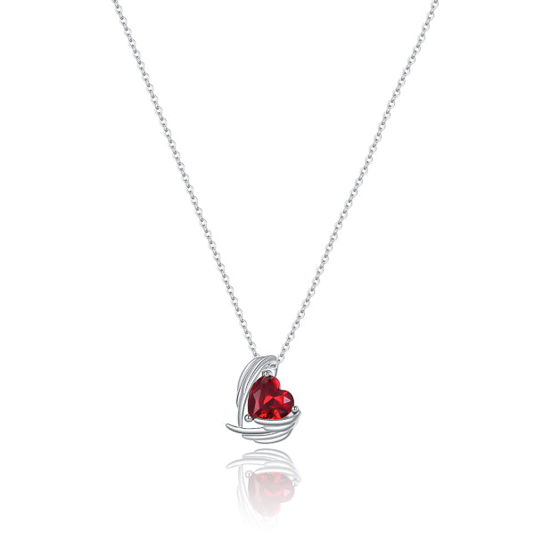 Garnet red crystal heart & angel wings pendant hanging from a silver necklace