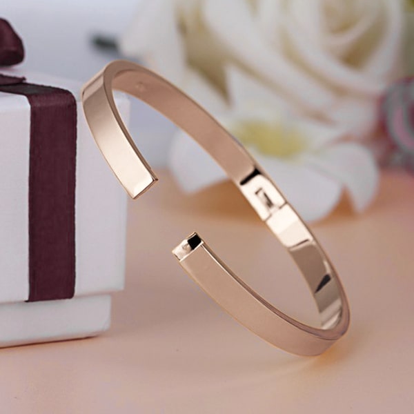 A 6mm rose gold bangle bracelet made of waterproof hypoallergenic stainless steel