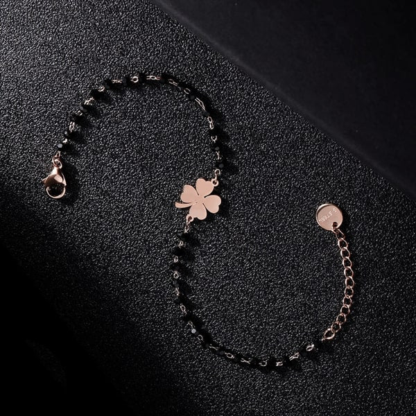 Waterproof rose gold clover bracelet made of stainless steel and black beads
