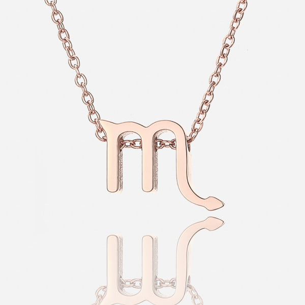 Rose gold Scorpio necklace display