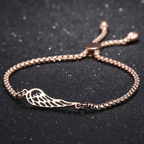 Rose gold angel wing bracelet close up details
