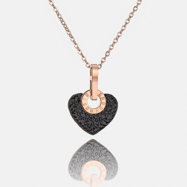 Black crystal heart pendant on a rose gold necklace details