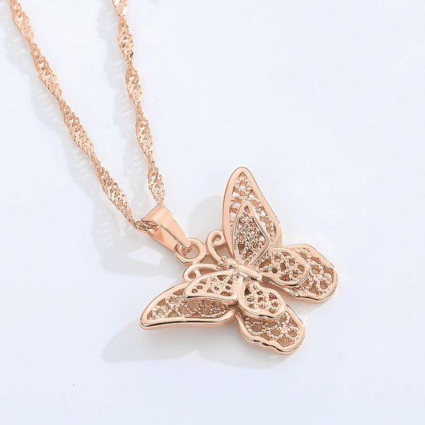 Rose gold butterfly necklace on a Singapore chain details