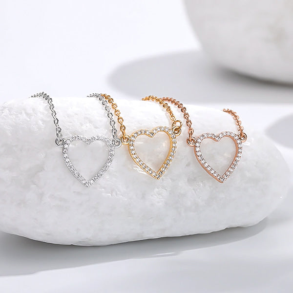 Rose gold crystal open heart necklace display
