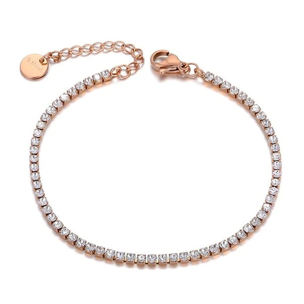 Rose gold crystal tennis anklet on a white background