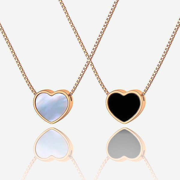 Both sides of the rose gold double-sided heart necklace