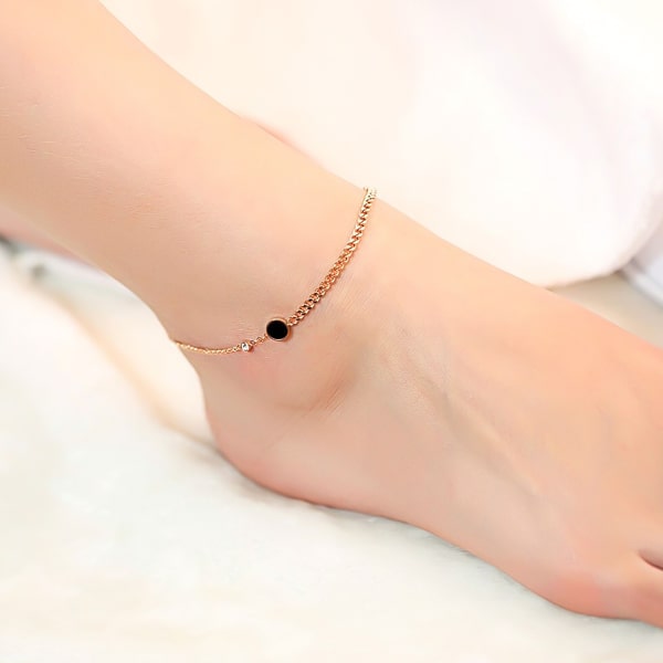 Rose gold elegant crystal anklet displayed on a womans ankle