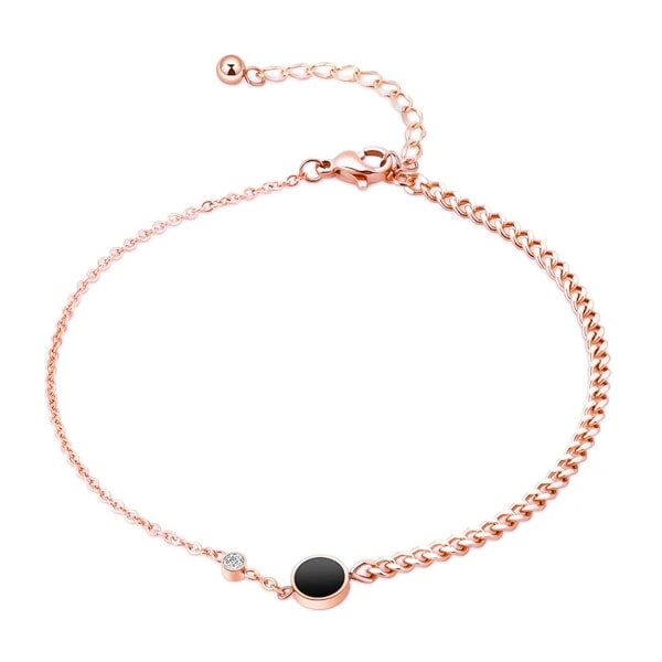 Rose gold elegant crystal anklet with a black and clear crystal