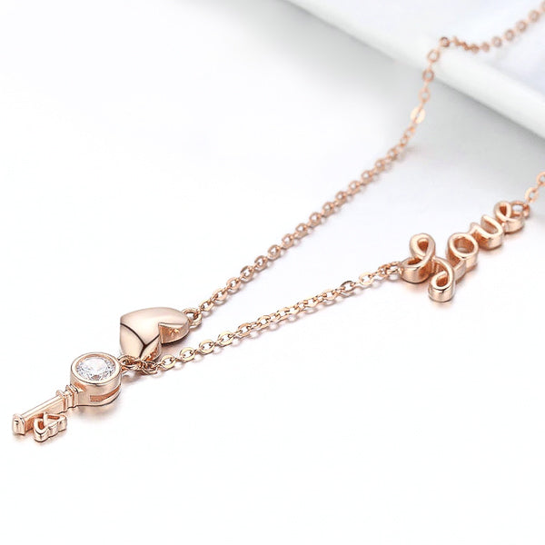 Rose gold key & heart love necklace display