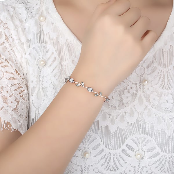 Rose gold rose crystal bracelet on a woman's wrist