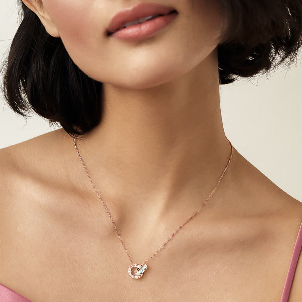 Woman wearing a rose gold timeless beauty necklace