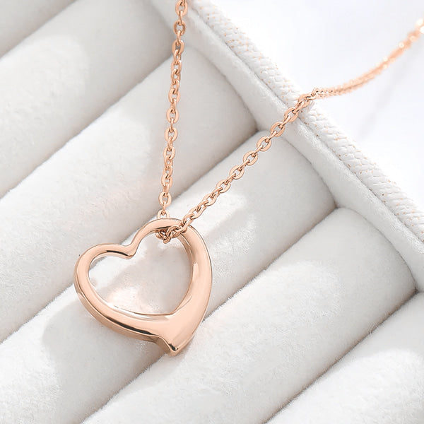 Rose gold wavy open heart pendant necklace display