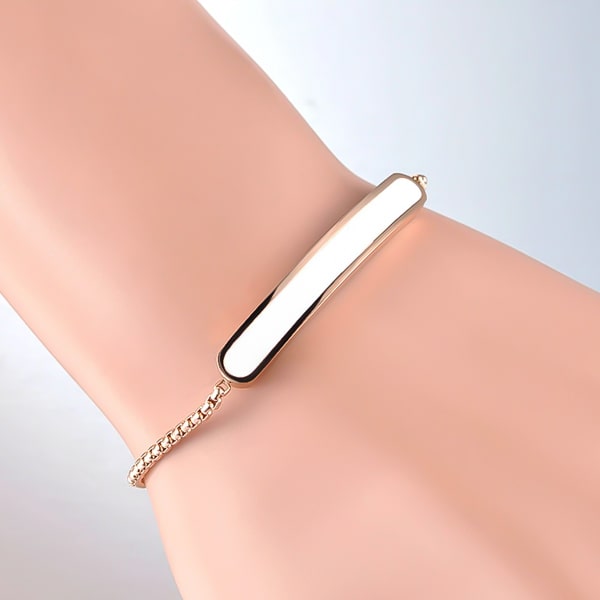 Rose gold white bar bracelet on a woman's wrist