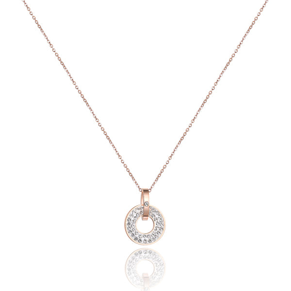 White crystal ring pendant on a rose gold necklace