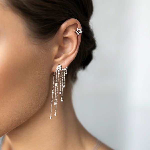 Model wearing shooting star chandelier earrings