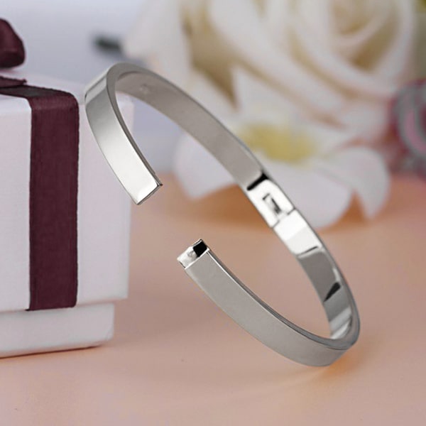 A 6mm silver bangle bracelet made of waterproof hypoallergenic stainless steel