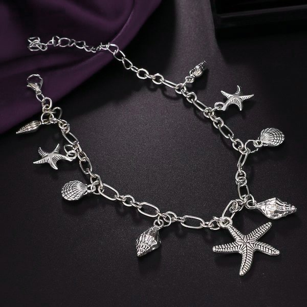 Silver beach anklet with starfish and seashell charms