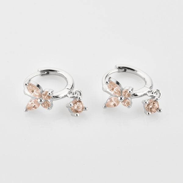 Silver and champagne crystal butterfly huggie hoop earrings details