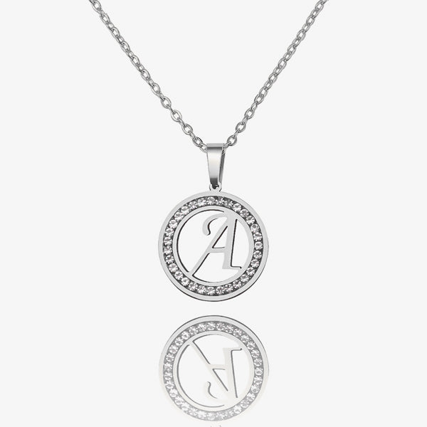 Round silver letter coin necklace with crystal halo