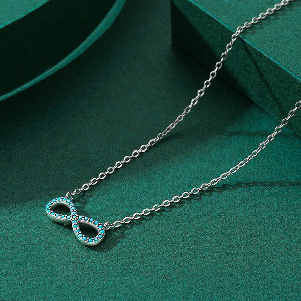 Silver infinity necklace with turquoise stones