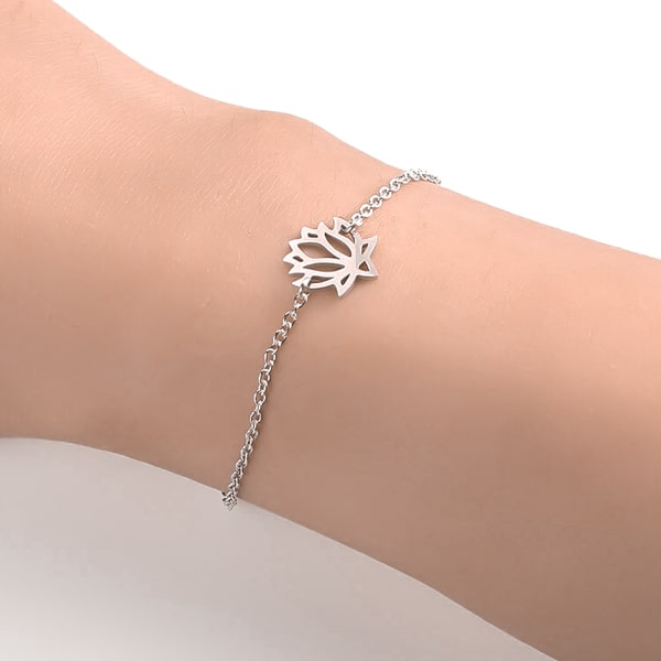 Woman wearing a silver lotus flower bracelet