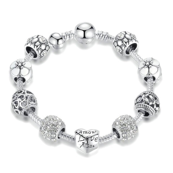 Silver love charm bracelet with heart, flower, butterfly charms and clear cubic zirconia