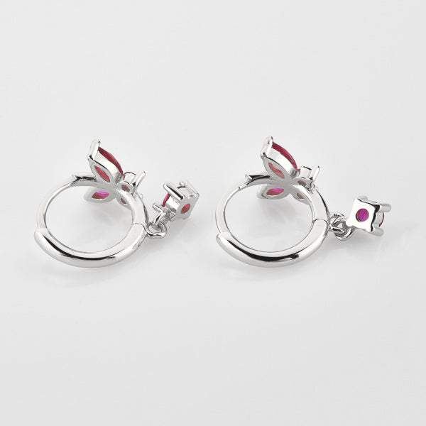 Silver and pink crystal butterfly huggie hoop earrings details